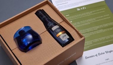 olive oil and glass in cardboard box