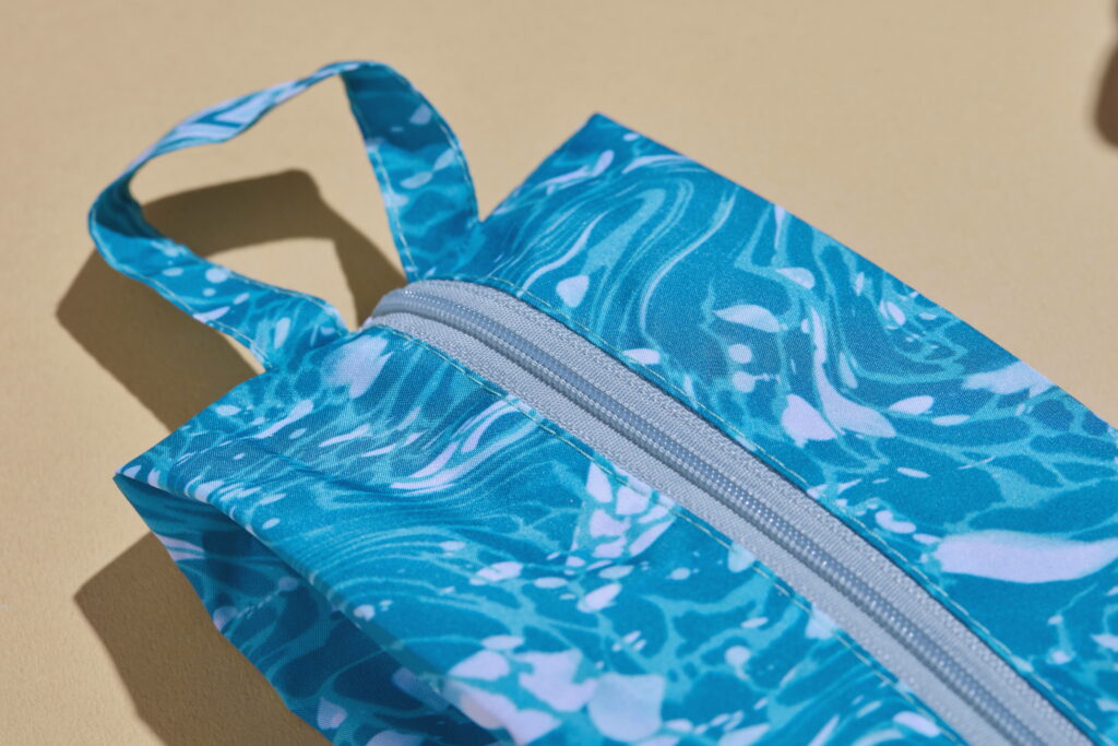 blue toiletry bag made with ocean bound plastic