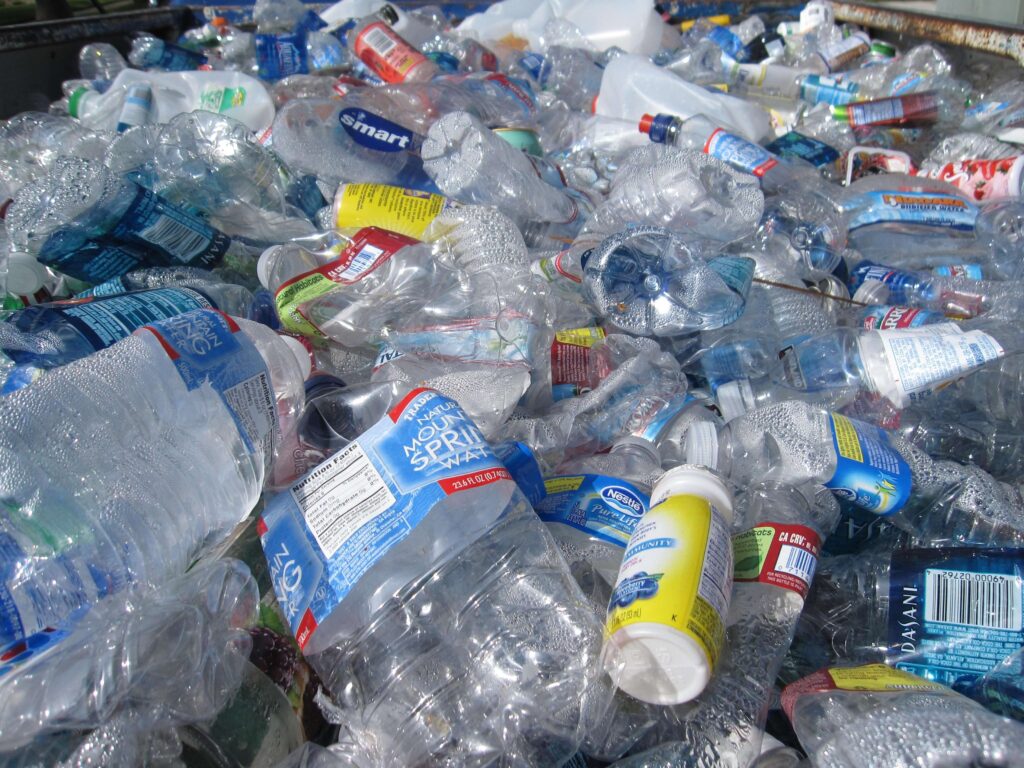 a pile of empty plastic bottles